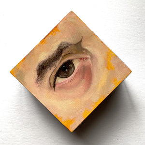 eye painting brown and yellow
