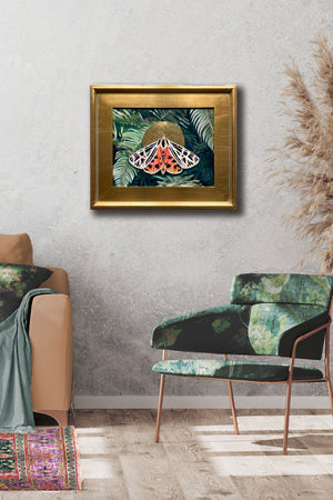 virgin tiger moth painting in gold frame on wall