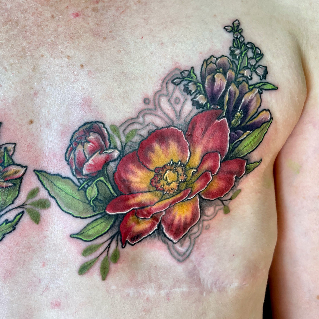 red floral mastectomy tattoo by Cass Brown