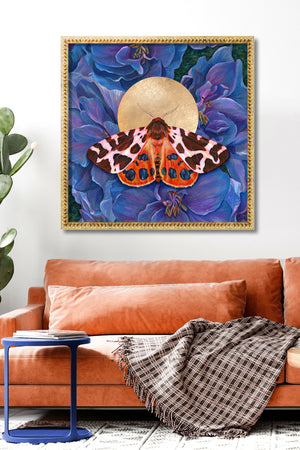 garden tiger moth art print blue delphinium flowers in gold frame on wall