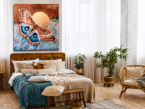 large polyphemus moth painting hanging over bed