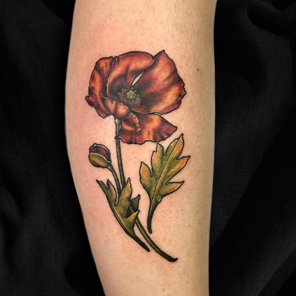 red poppy color tattoo by Cass Brown