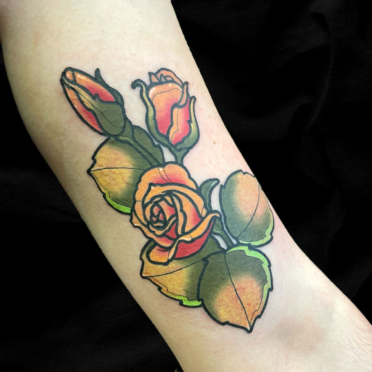 rose color neotraditional tattoo by Cass Brown