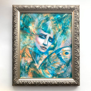 'Our Skin is Melted Moons' emotional art teal, yellow, green colorful acrylic painting of female face with butterfly wings in antique silver frame by aimee schreiber