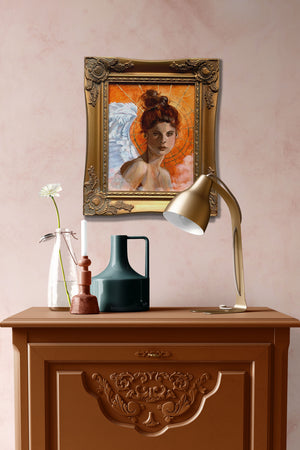 angel painting in antique gold frame on bedroom wall