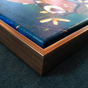 detail of antique gold wood floater frame