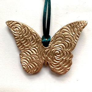 green blue gold butterfly ornament back texture