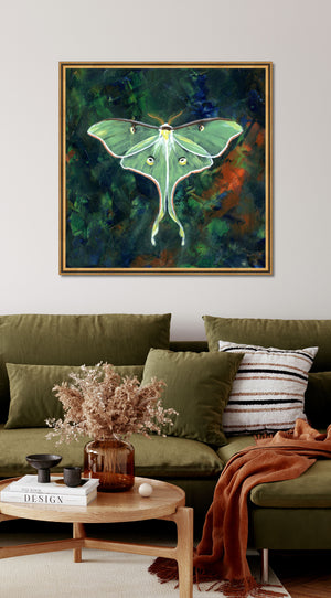 luna moth art print luminosity framed over sofa