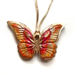 pink, orange, gold butterfly ornament