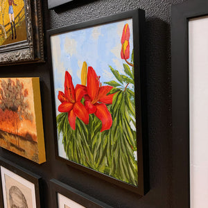 red lily painting by Danny Schreiber gallery wall