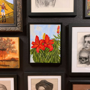 red lily painting on gallery wall