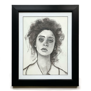 female face drawing - vanna charcoal portrait drawing in black frame by Danny Schreiber