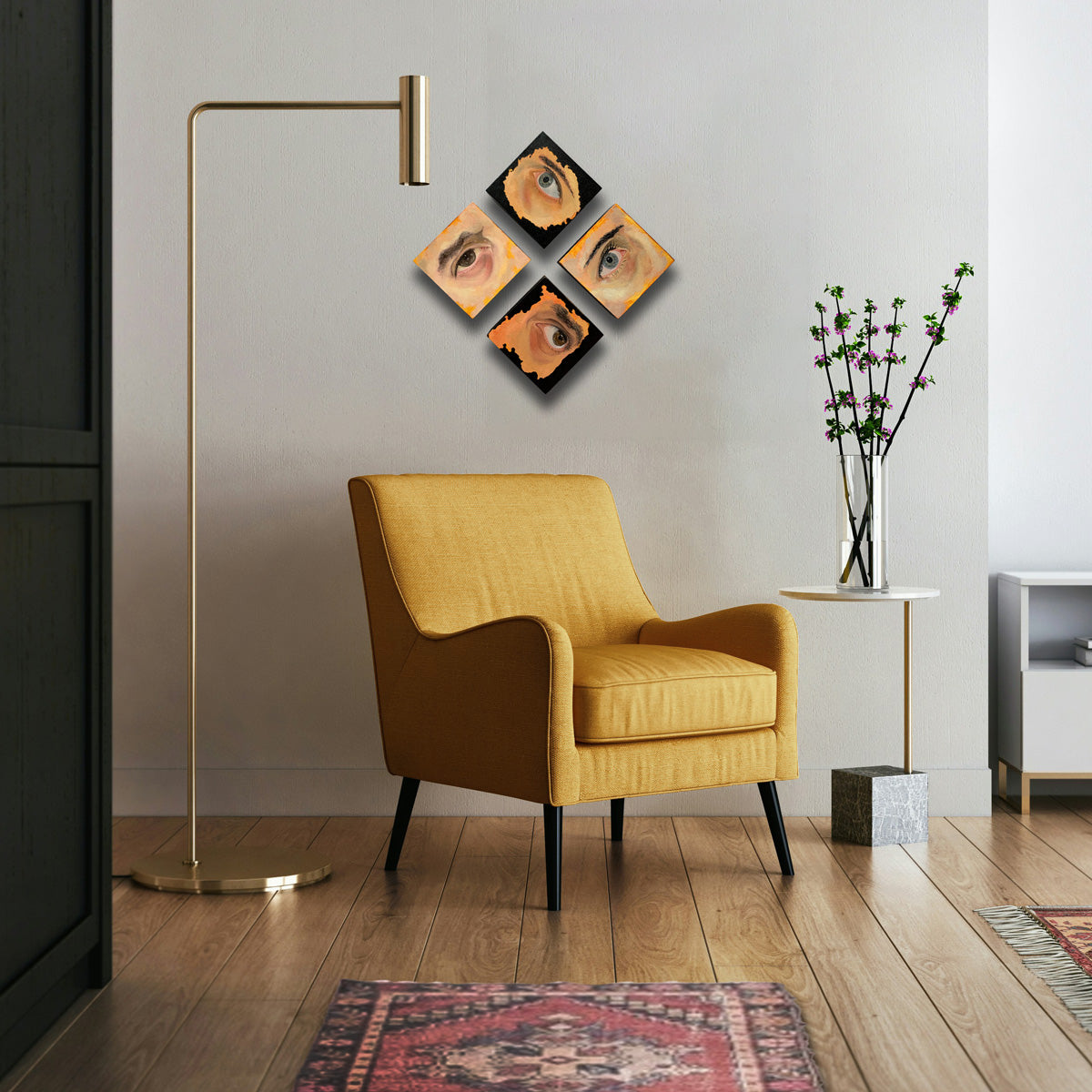 4 small eye paintings hanging on wall