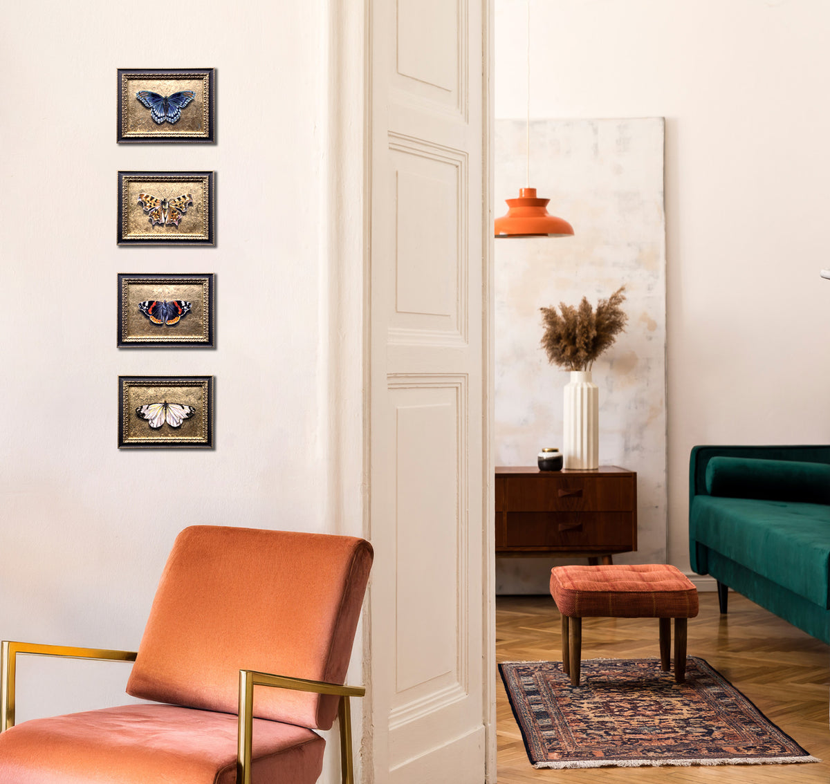 4 small gold butterfly paintings on wall 