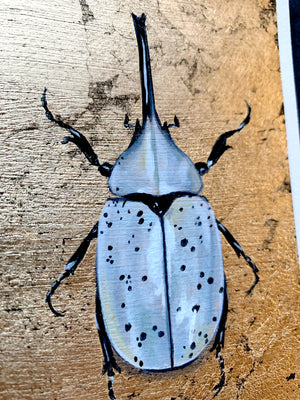 white hercules beetle painting air element gold leaf