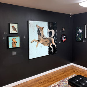 Wolf painting on black wall