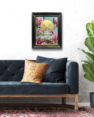 moth and pink magnolia painting on wall