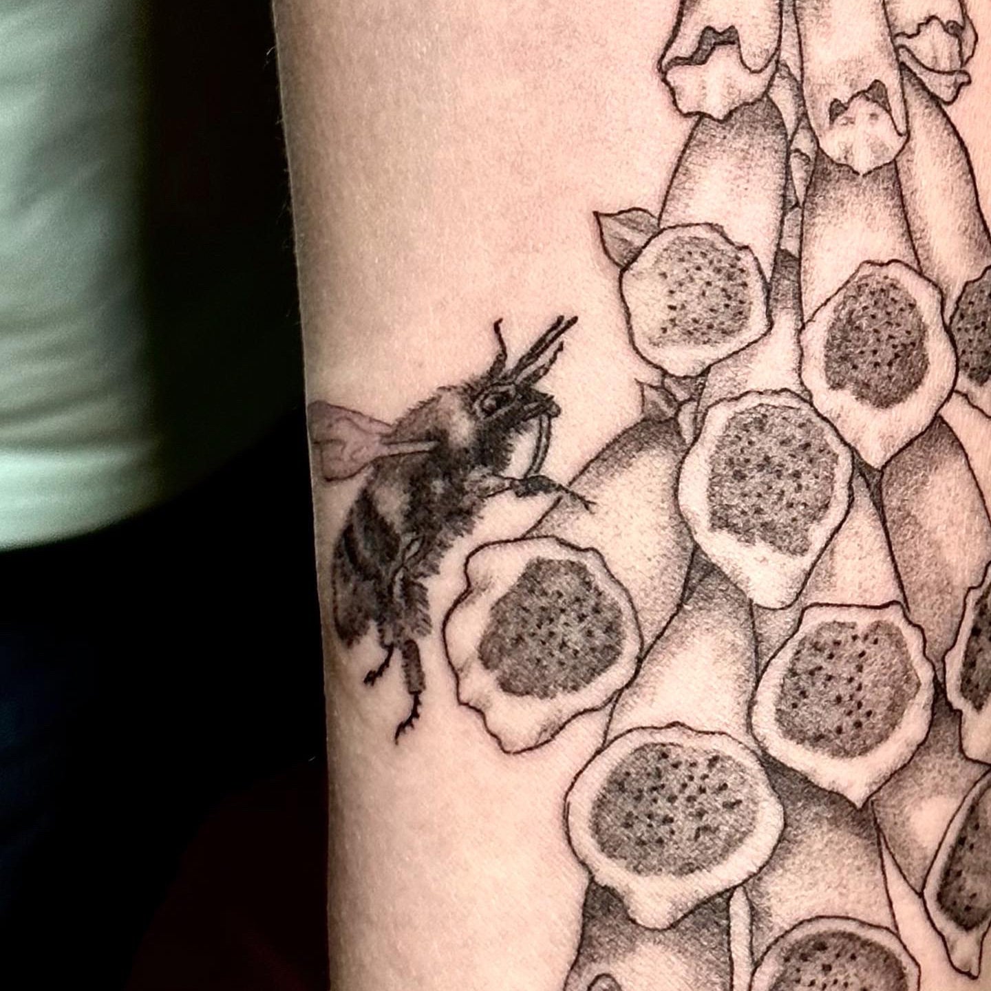 bee foxglove tattoo by Danny Schreiber