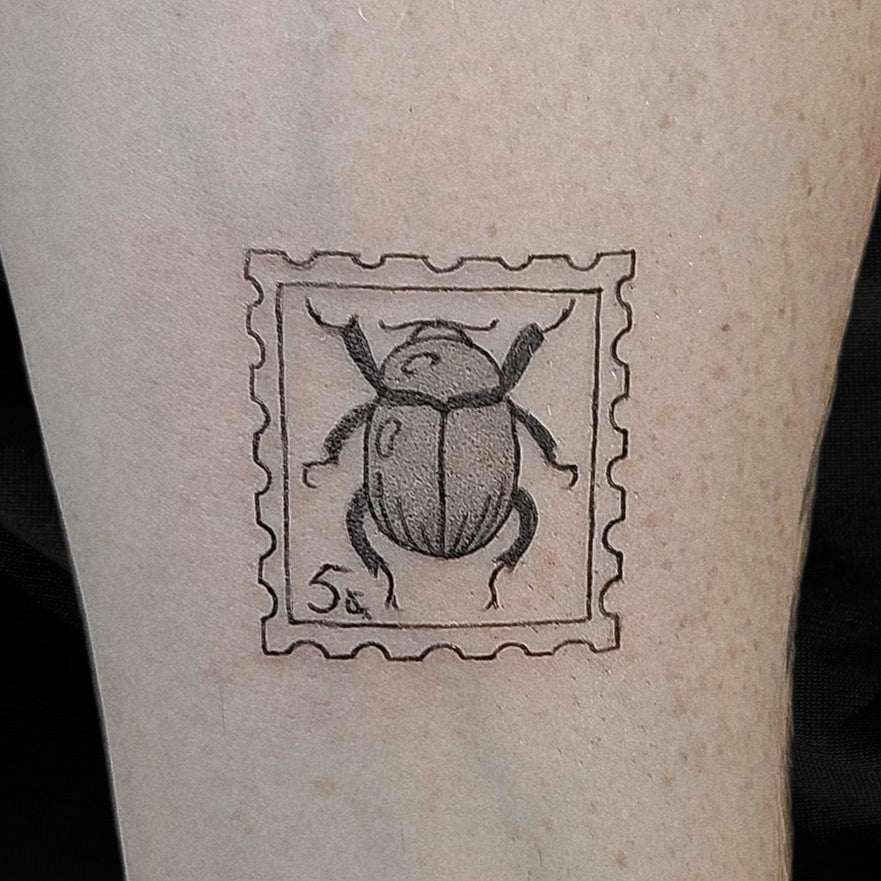 beetle stamp tattoo by Mary Kuzmin