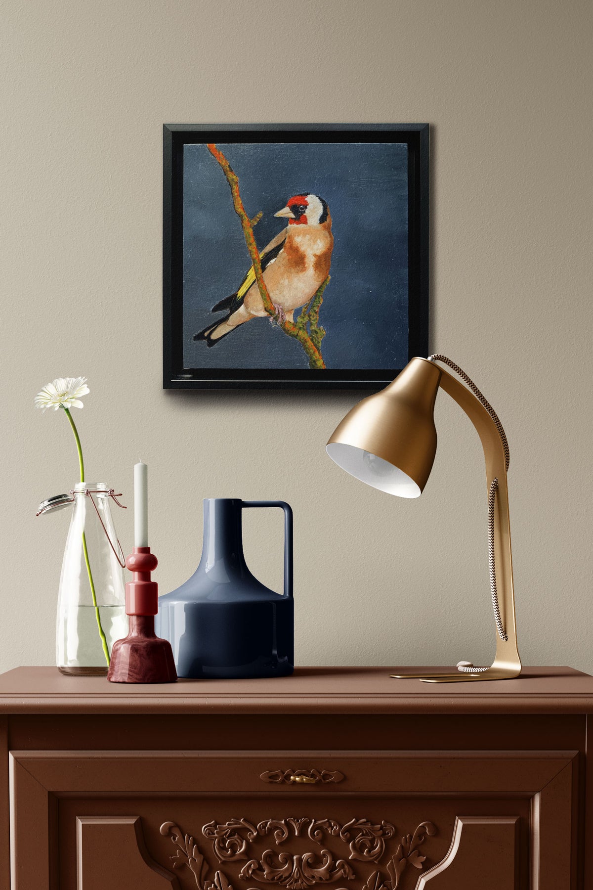 small oil painting of bird hanging over side table