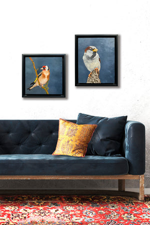 small oil paintings of birds hanging on wall