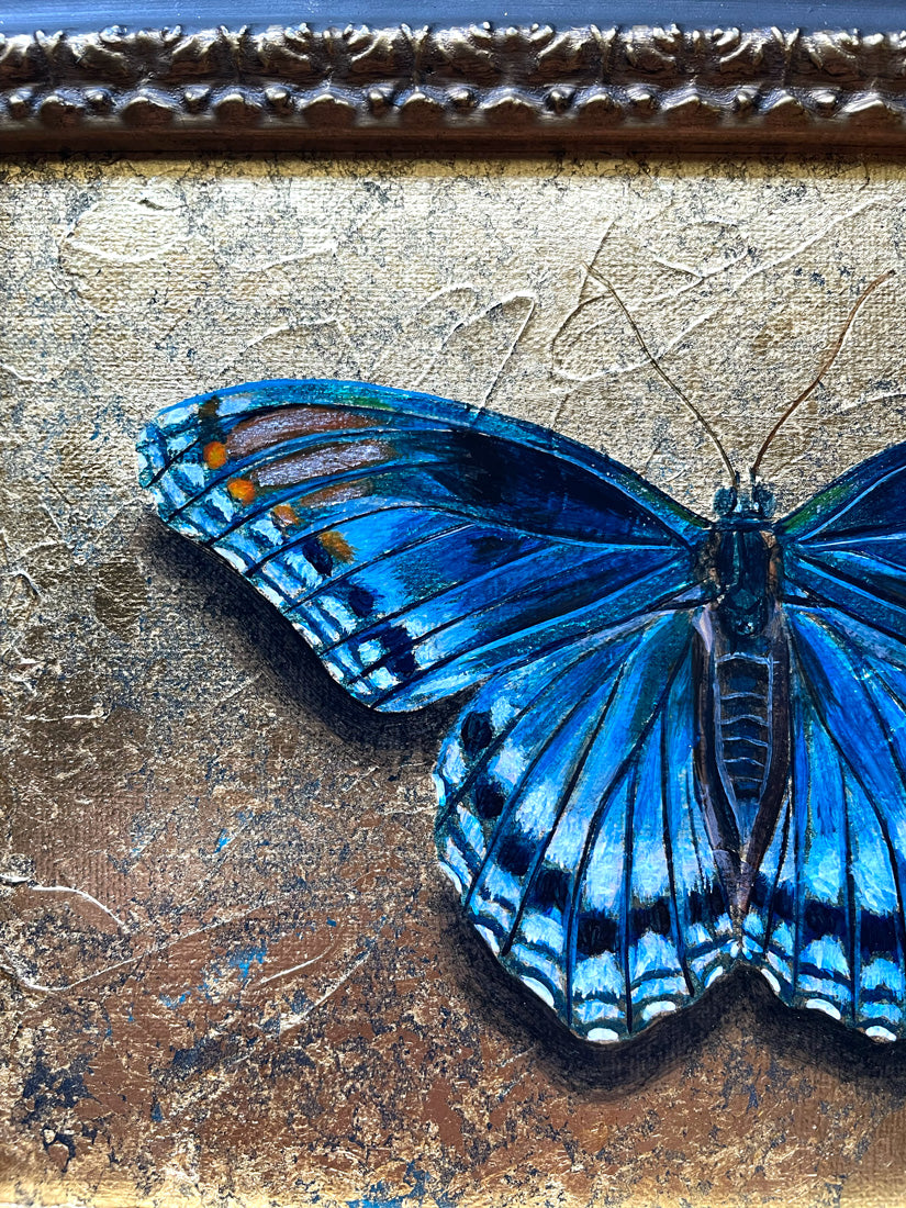 blue butterfly painting with gold leaf detail