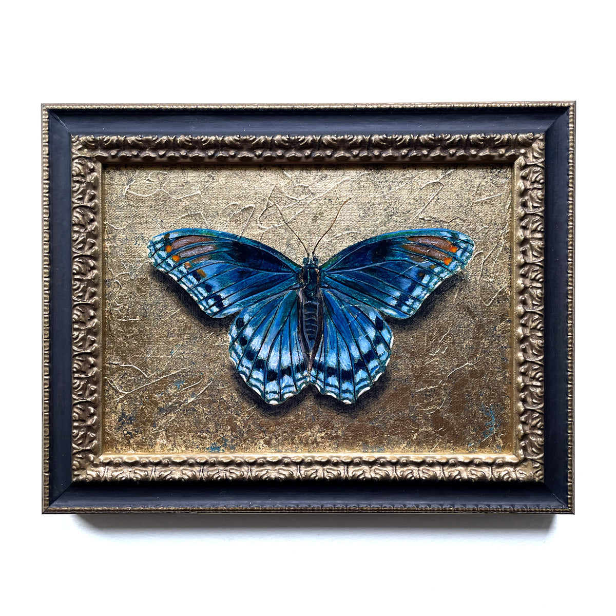 blue butterfly painting with gold leaf
