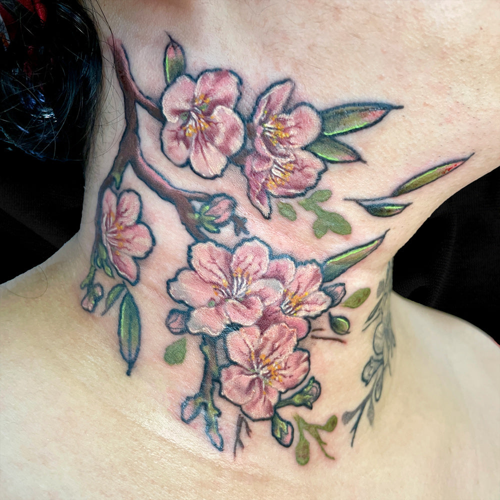 cherry blossom neck tattoo