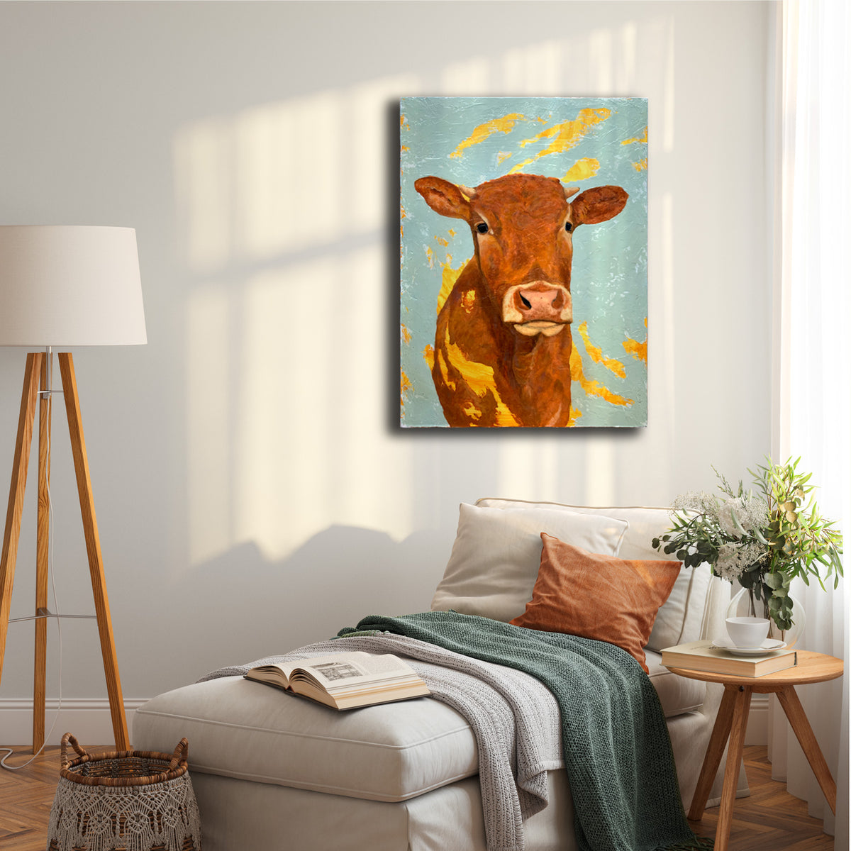 cow painting hanging on wall