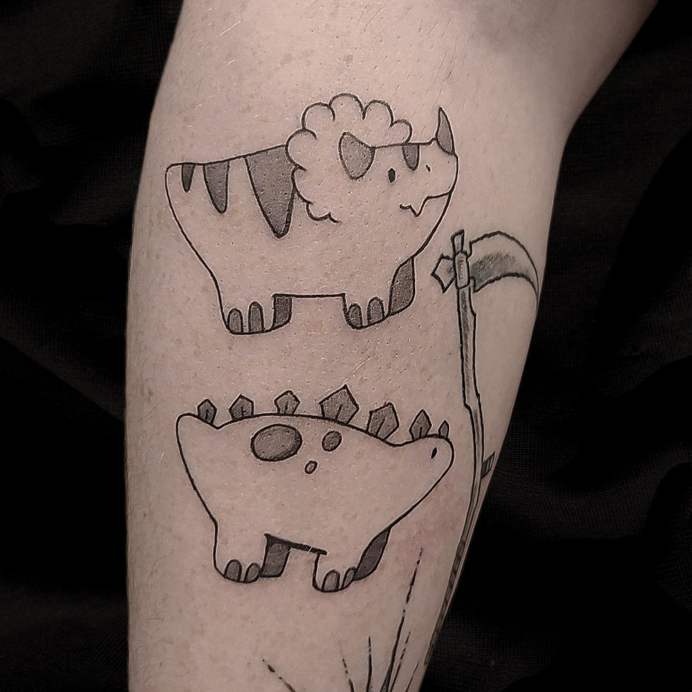 dinosaur tattoo by Mary Kuzmin