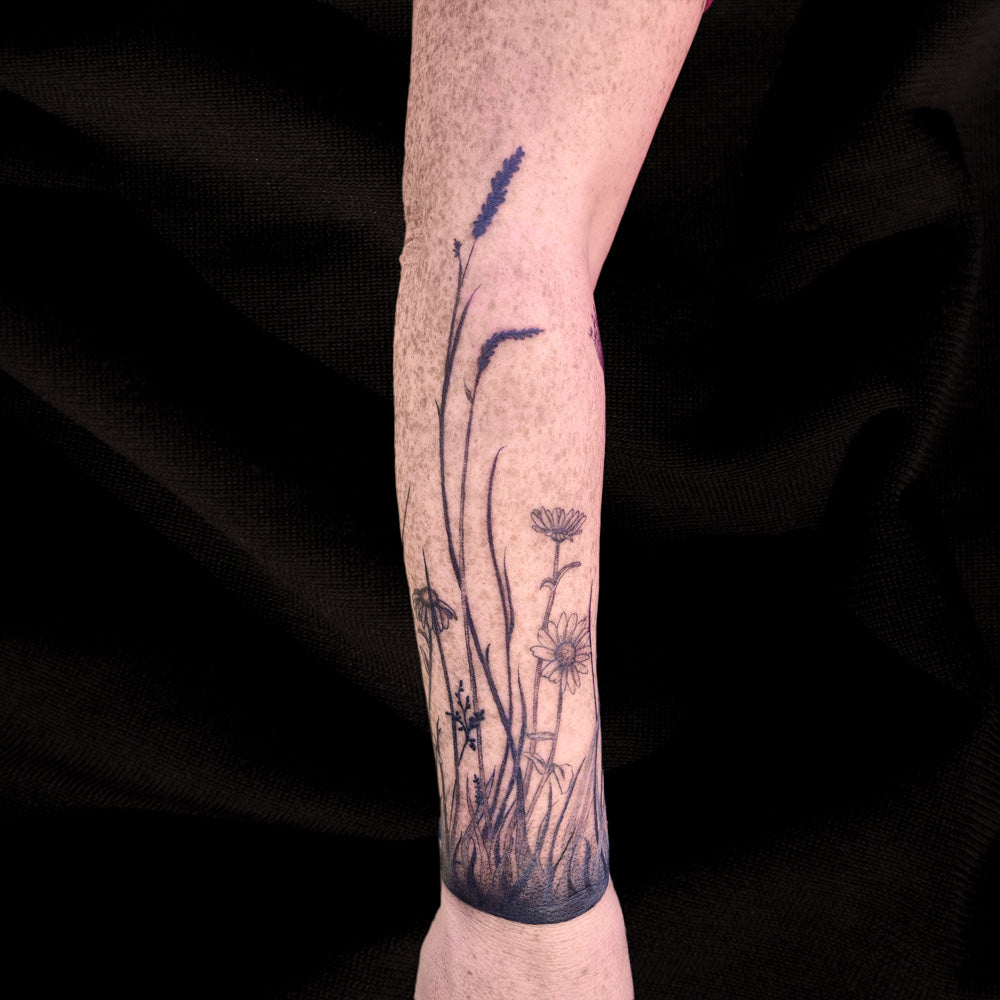 wildflower arm band tattoo by Lydia Pitts