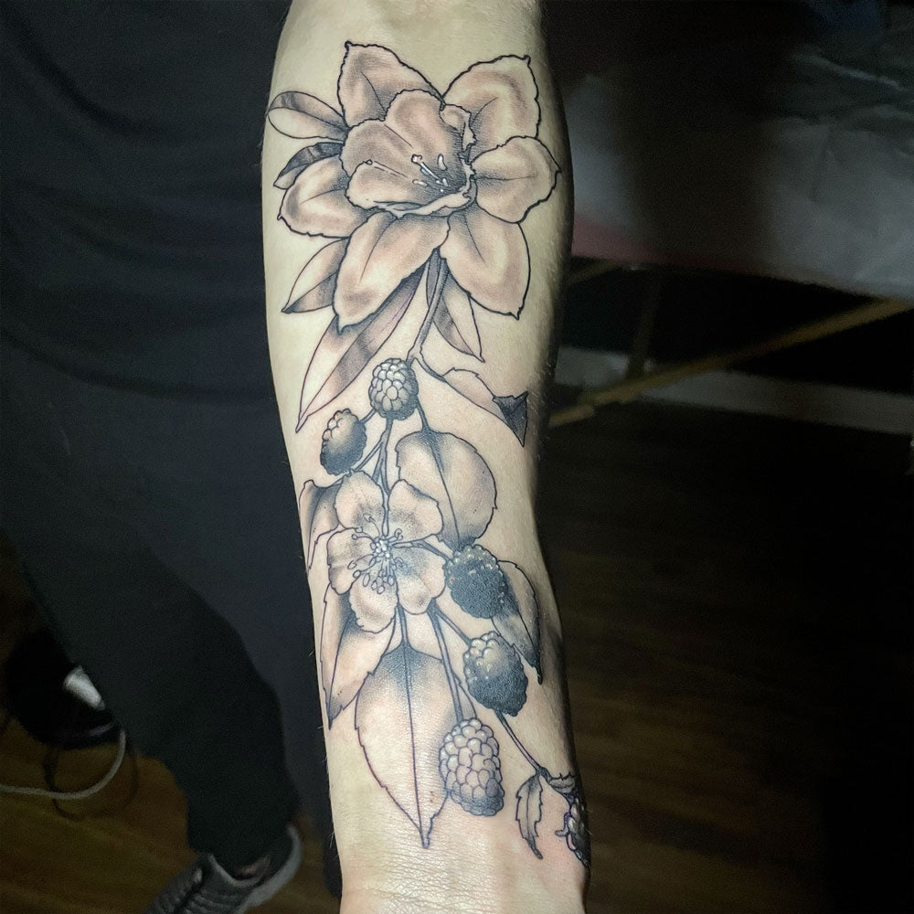 floral and berry tattoo by Cass Brown