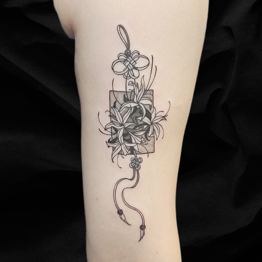 floral ribbon tattoo by Mary Kuzmin