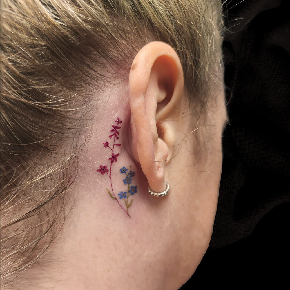 fine line floral behind ear tattoo by Lydia Pitts