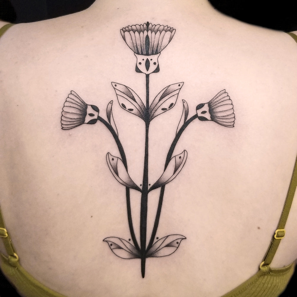 flower spine tattoo by Lydia Pitts