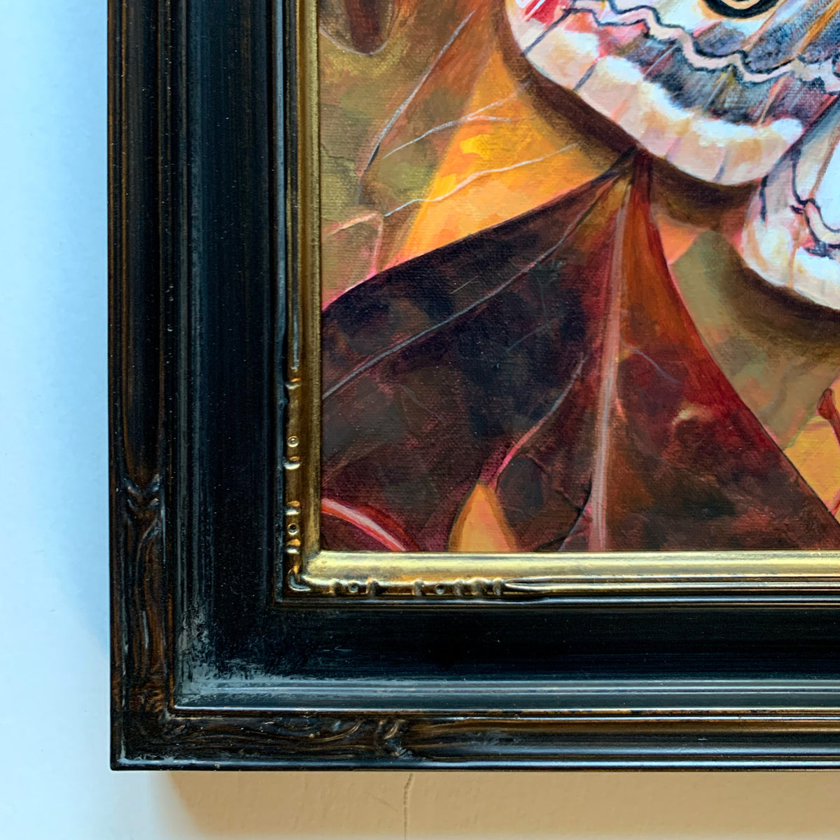 &#39;Glimmer&#39; female emperor moth painting black and gold carved frame detail