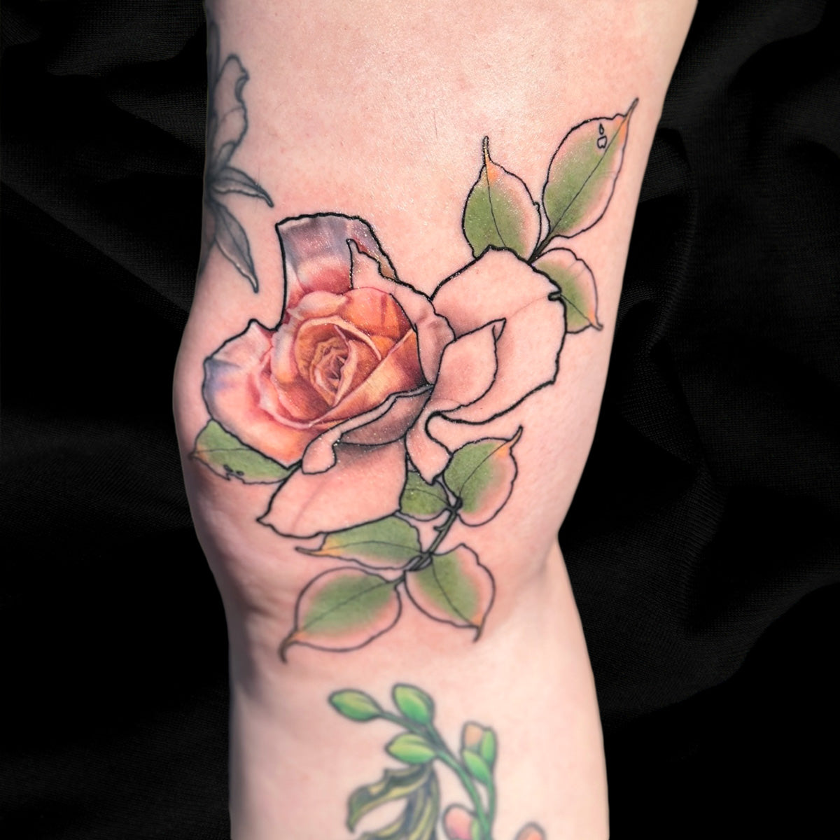 hybrid realism rose tattoo by Cass Brown
