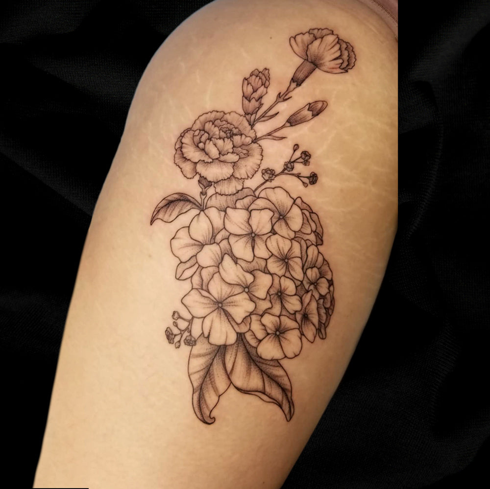 hydrangea thigh tattoo by Lydia Pitts