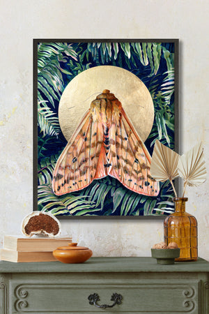 Isabella tiger moth fern art print in black frame on wall