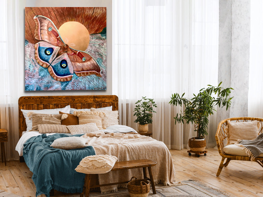 large polyphemus moth painting hanging over bed
