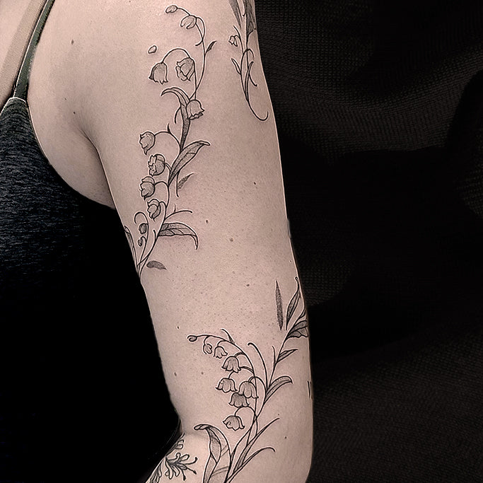 lily of the valley tattoo by Mary Kuzmin