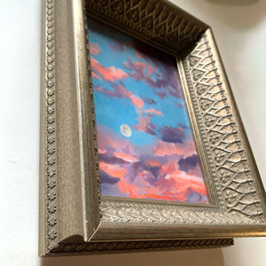 moonrise cloudscape painting ornate antique silver frame detail