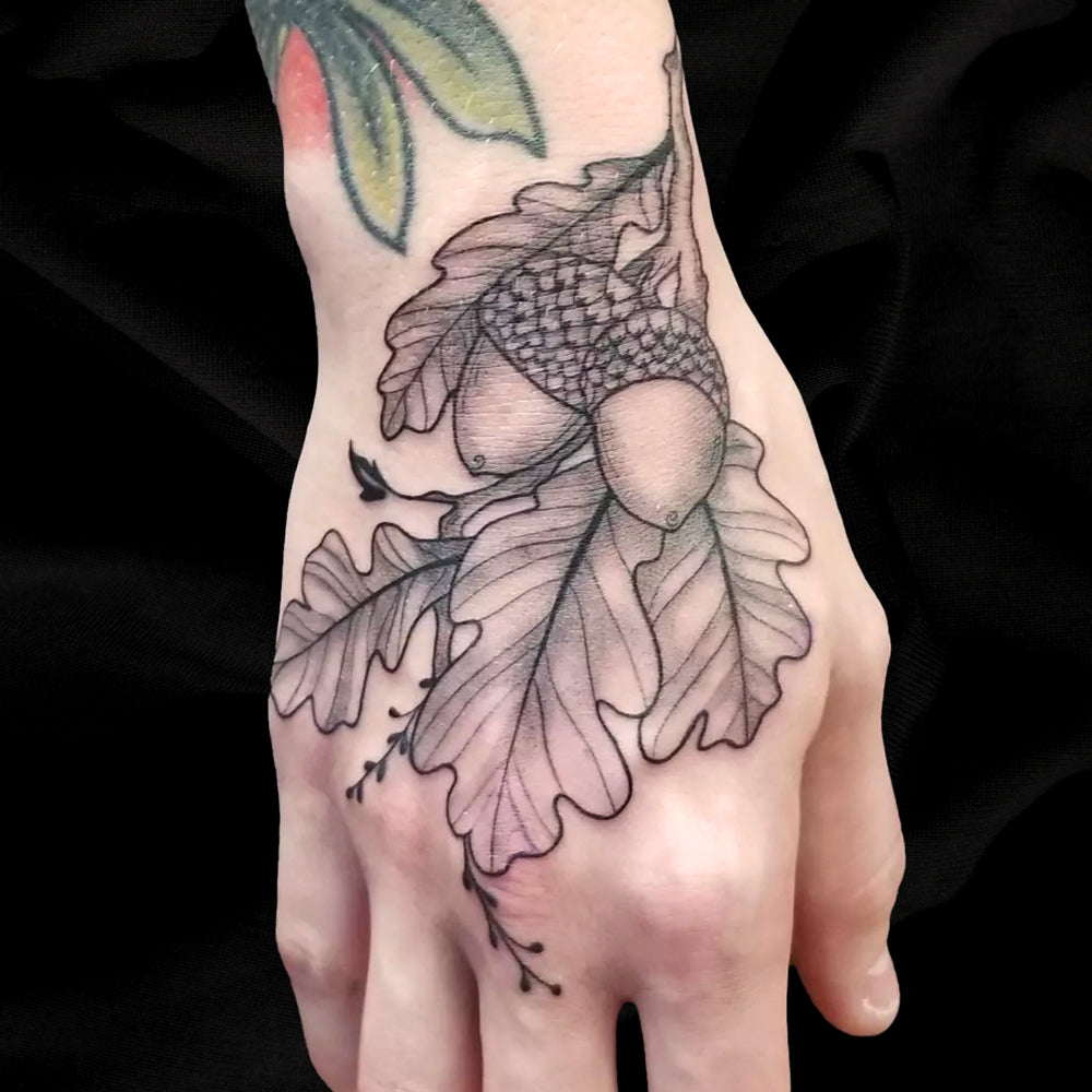 oak leaf acorn hand tattoo by Lydia Pitts