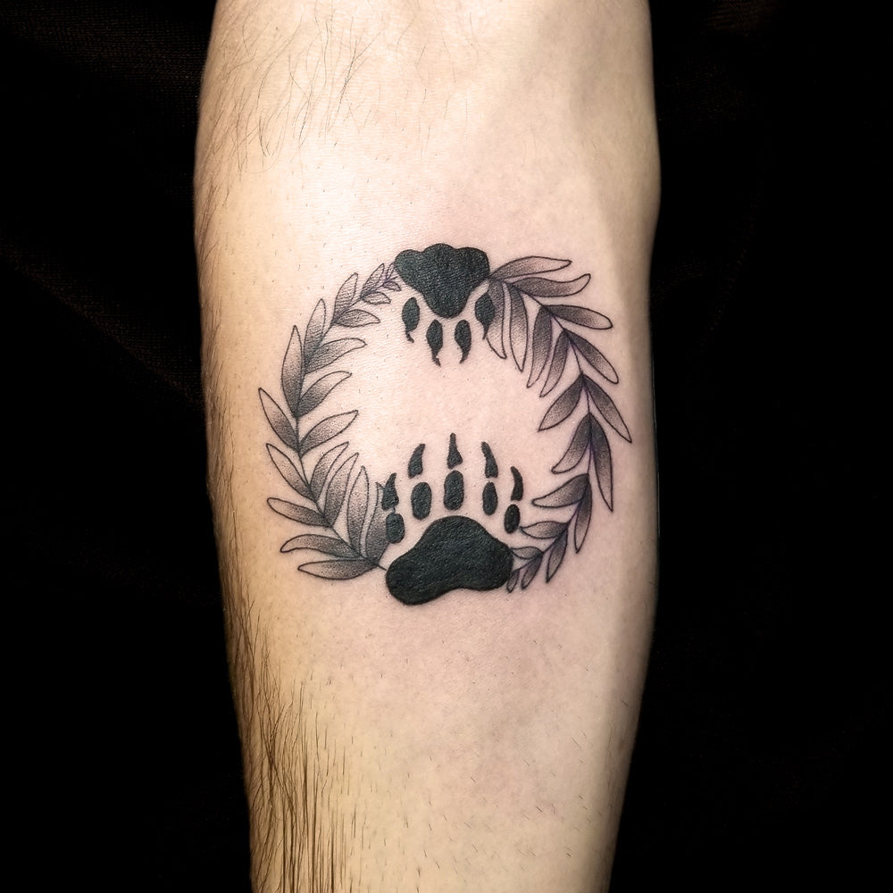 paw print tattoo by Lydia Pitts