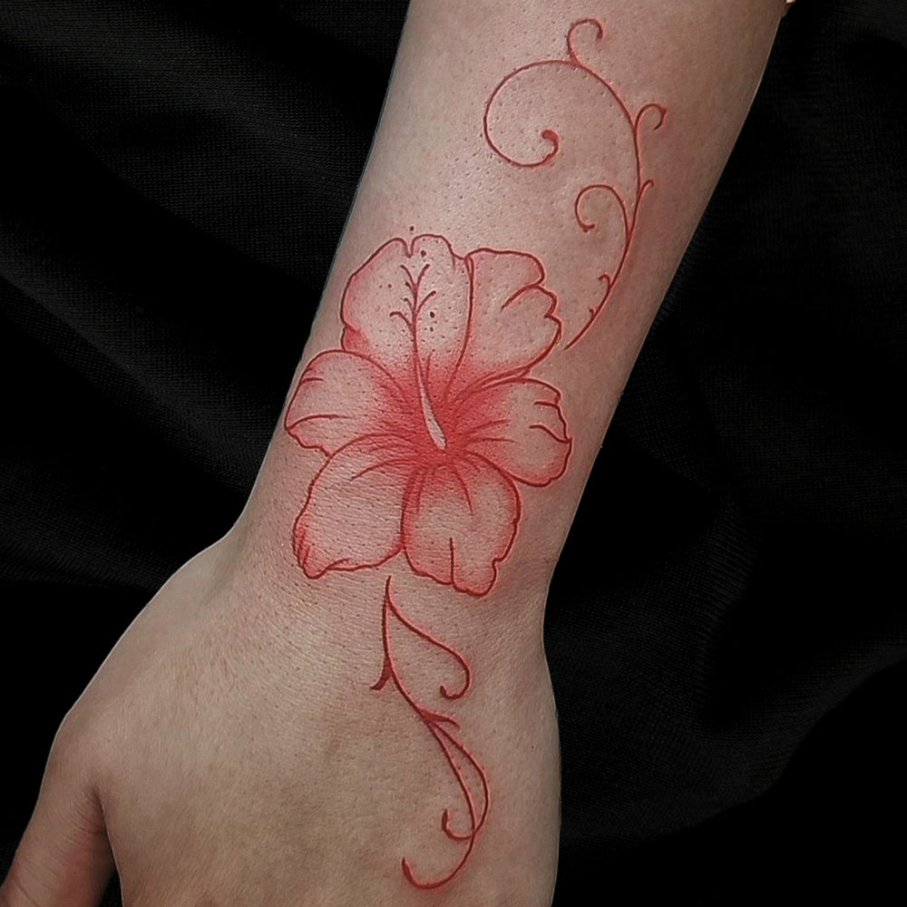 red hibiscus tattoo by Mary Kuzmin