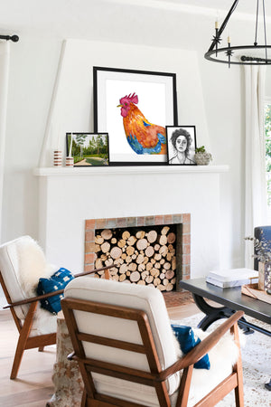 rooster art print on fireplace mantle