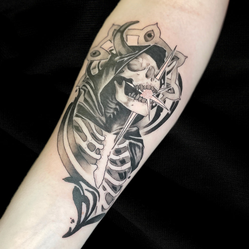 Skull with horns tattoo by Cass Brown