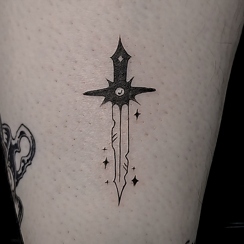 sword tattoo by Mary Kuzmin