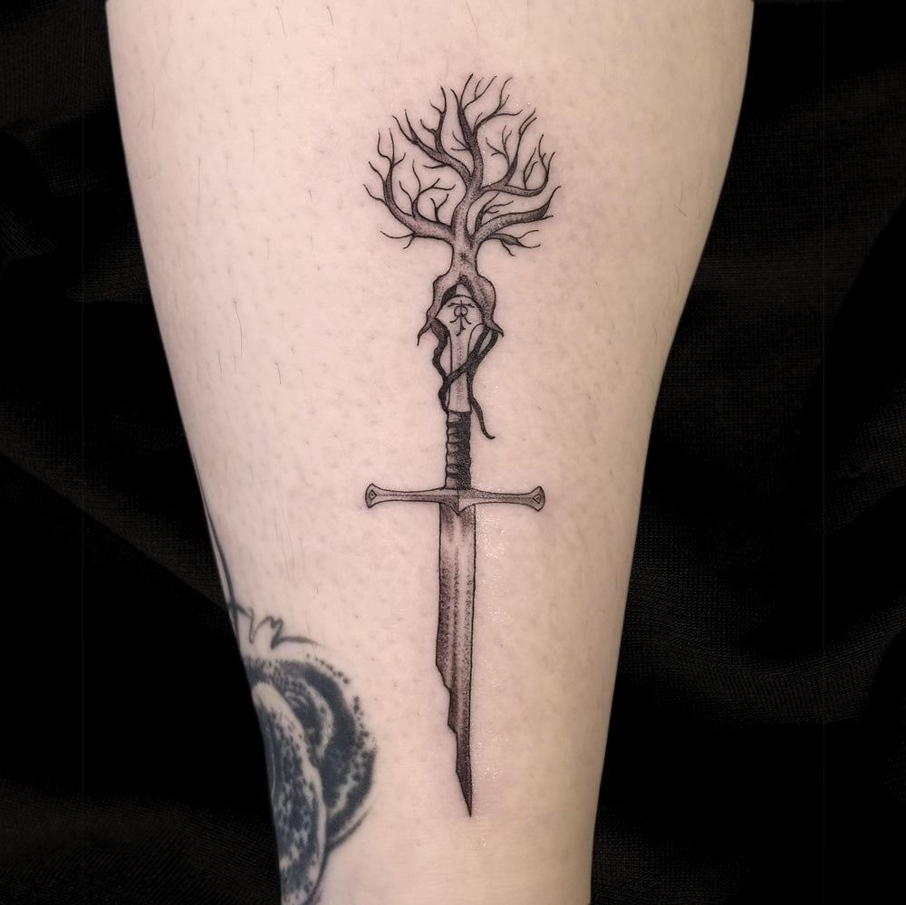 tree sword tattoo