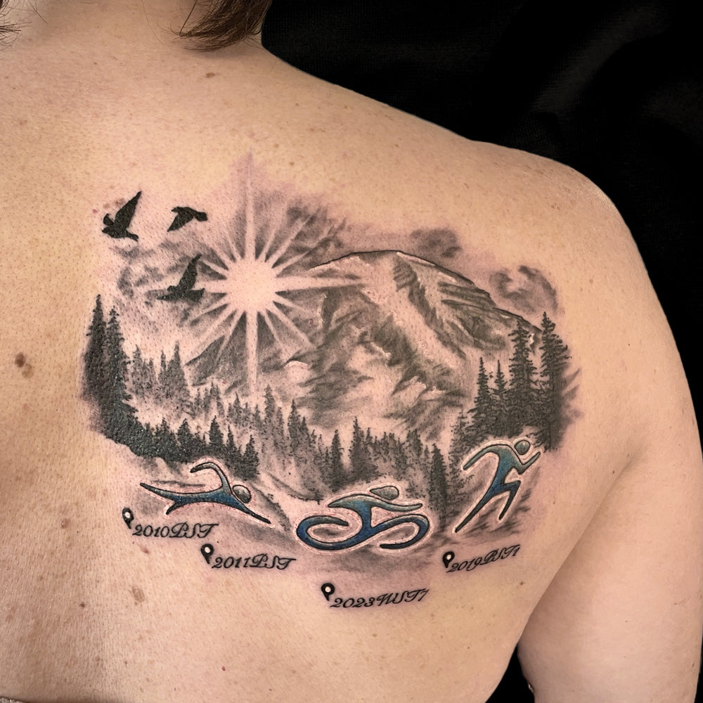 triathalon mountain tattoo by Cass Brown